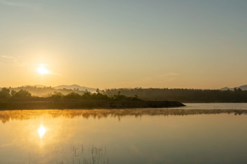 Fototapeta na wymiar View at Ban Thong Suk Reservoir, Songkhla, Thailand at sunrise.