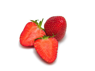 ripe juicy red strawberries - 2 slices and one whole cut on a white background isolated