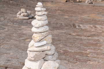 Fototapeta na wymiar beach stone zen stone tower