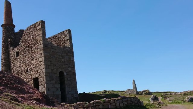 The Poldark famous tin and copper mine location known as wheal leisure. The real name is wheal owles, a world heritage site in the cornish countryside close to beautiful cliffs. Zoom in 4k footage