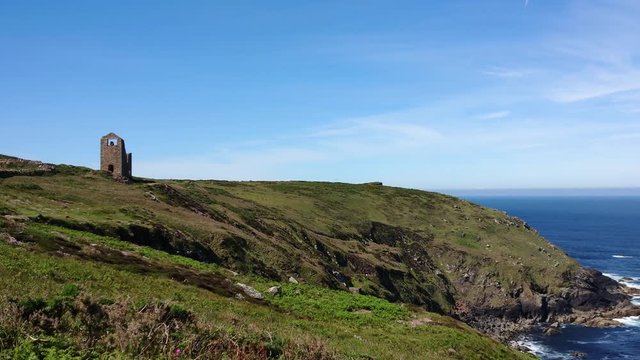The Poldark famous tin and copper mine location known as wheal leisure, a world heritage site in the cornish countryside. Panoramic 4k footage from the cliff to the mine