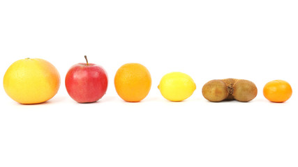 different fruit on a white background. healthy fresh vegetables and food.