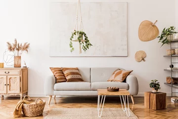 Foto op Canvas The stylish boho compostion at living room interior with design gray sofa, wooden coffee table, commode and elegant personal accessories. Honey yellow pillow and plaid. Cozy apartment. Home decor © FollowTheFlow