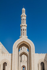 Fototapeta na wymiar Minaret of Sultan Qaboos Grand Mosque in Muscat, Oman