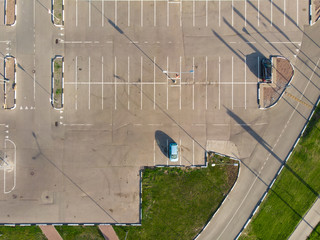 Image from above ground parking cars during
