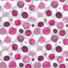 Seamless pattern with pink large and small deformed polka dots
