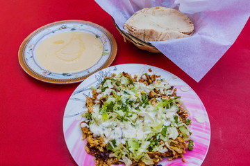 Meal in Oman - kebab and hummus