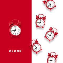 Flat lay concept of red alarm clocks and a pattern of alarm clocks on the background