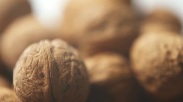 Closeup Rack Focus Of Fresh Organic Walnuts.