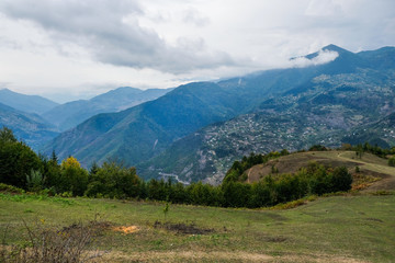 Fototapeta na wymiar Amazing caucasus mountains of Khulo village, Adjara region, Georgia. View from Tago village. Colorful autumn season