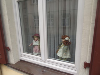 Doll toys in the window