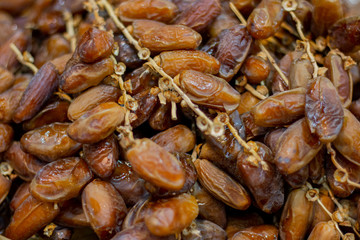 Close up fruits of date palm on the basket