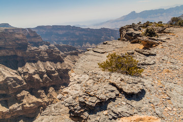 Wadi Ghul canyon in Hajar Mountains, Oman