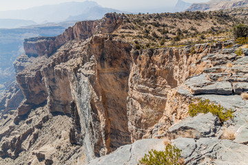 Rims of Wadi Ghul canyon in Hajar Mountains, Oman
