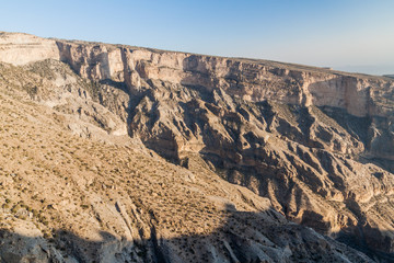 Fototapeta na wymiar Wadi Ghul canyon in Hajar Mountains, Oman