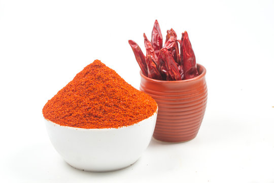 indian red chili powder isolated on white background