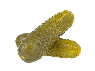 Two marinated pickled cucumbers isolated on white background