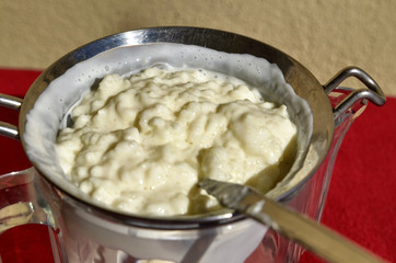 Close-up shot while filtering Kefir