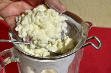 Close-up shot while filtering Kefir