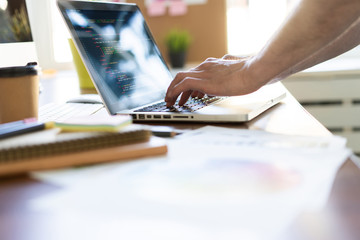 Man hands working on laptop