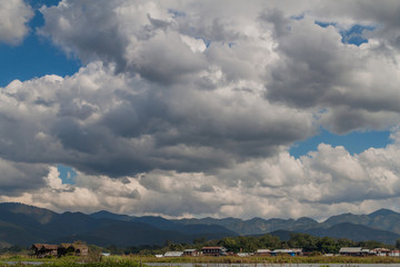 Cloudy sky and mountains behind Inle lake, Myanmar