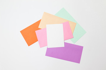 Heap of colorful envelopes on working desk. Mockup for business mail, blogging and office...