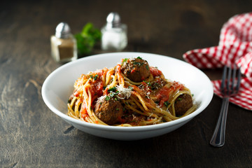 Homemade pasta with meatballs and tomato sauce