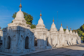 White stupas around Kuthodaw pagoda in Mandalay, Myanmar