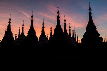 Stupas around Sandamuni (Sandamani or Sandar Mu Ni)  pagoda during dusk in Mandalay, Myanmar