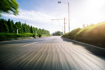 Fototapeta na wymiar driving on highway