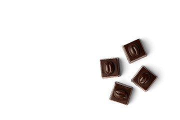 Four coffee sweets praline isolated on white background. Top view.