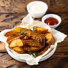 Roasted potato wedges with fresh rosemary