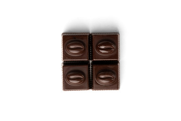 Four coffee sweets praline isolated on white background. Top view.