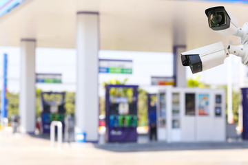 Outdoor and waterproof ip security surveillance video camera at a gas station.