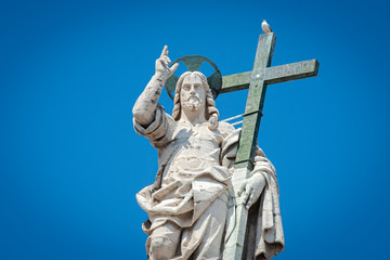 Vatican City - June05 , 2019:  Statue of Jesus on the top of Saint Peter Basilica facade - Seagull