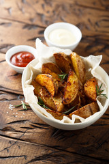 Roasted potato wedges with fresh rosemary