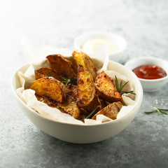 Roasted potato wedges with fresh rosemary