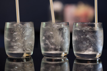 Three glass of drinking ice water with ice cube. Ice water drinking concept.