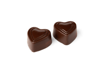 Chocolate sweets in heart shape isolated on white background.