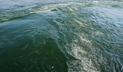 Abstract water background. River. Green water. Dark water texture. Natural background