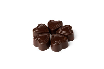 Chocolate sweets in heart shape isolated on white background.