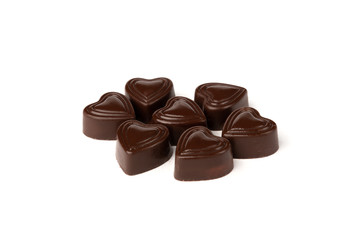Chocolate sweets in heart shape isolated on white background.