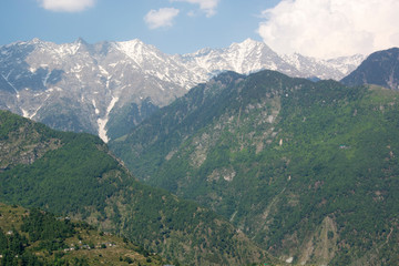 Naklejka na ściany i meble A beautiful view of the Dhauladhar Himalayan Range on a clear day at Kareri, Himachal Pradesh, India