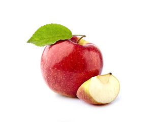 Naklejka na ściany i meble Red apples with leaf on white background