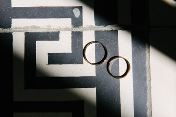 Wedding rings close-up macro shot. Rings of the bride and groom