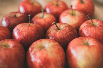 Red ripe apples as background for design. 