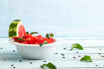 Cold watermelon slices in a bowl