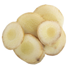 heap of slices of fresh galangal root  isolated on white background. top view