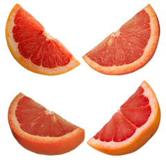 set of slices of red grapefruit isolated on white background