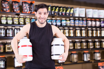 sportman  holding  sport nutrition products